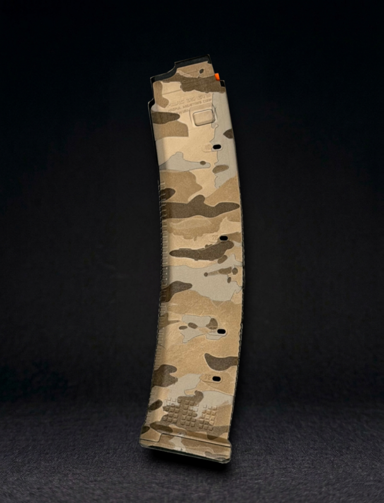 side view of a CZ Scorpion magpul pmag laser engraved with arid desert camo pattern