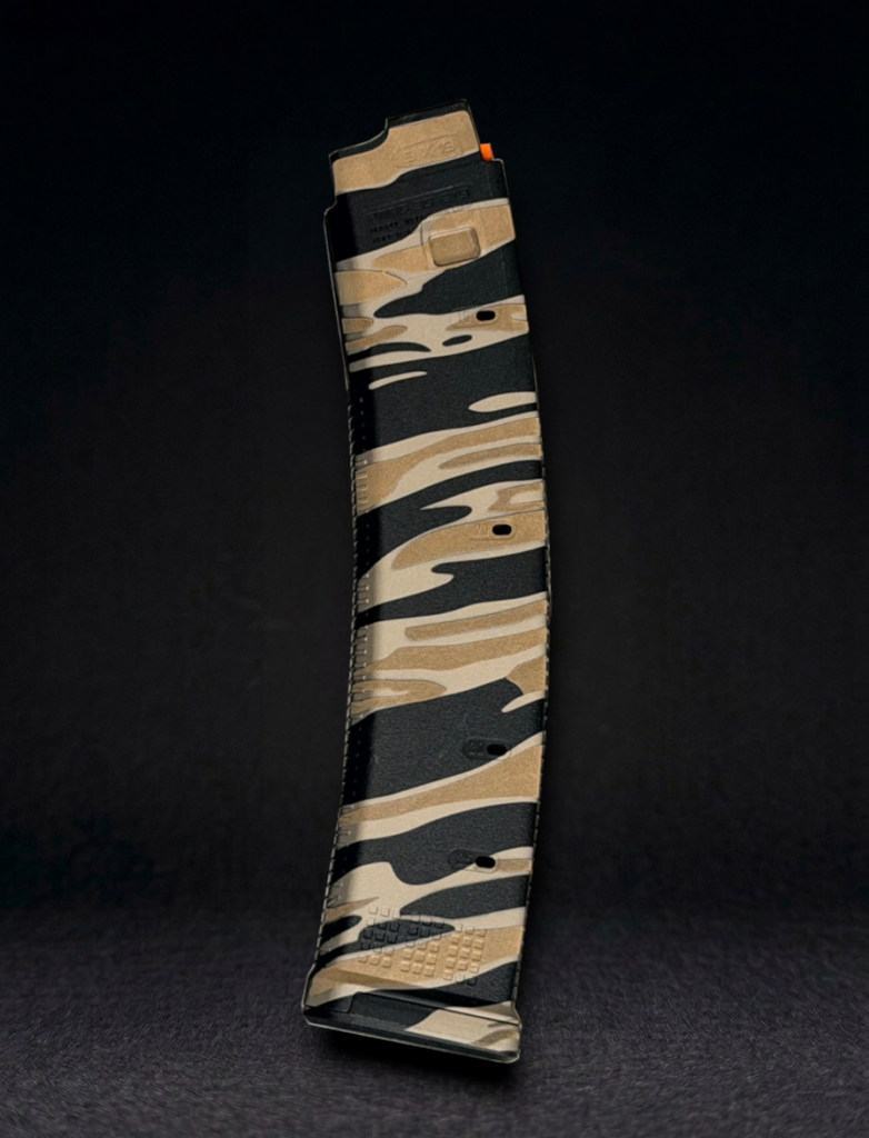 side view of a CZ Scorpion magpul pmag laser engraved with desert tiger stripe camo pattern