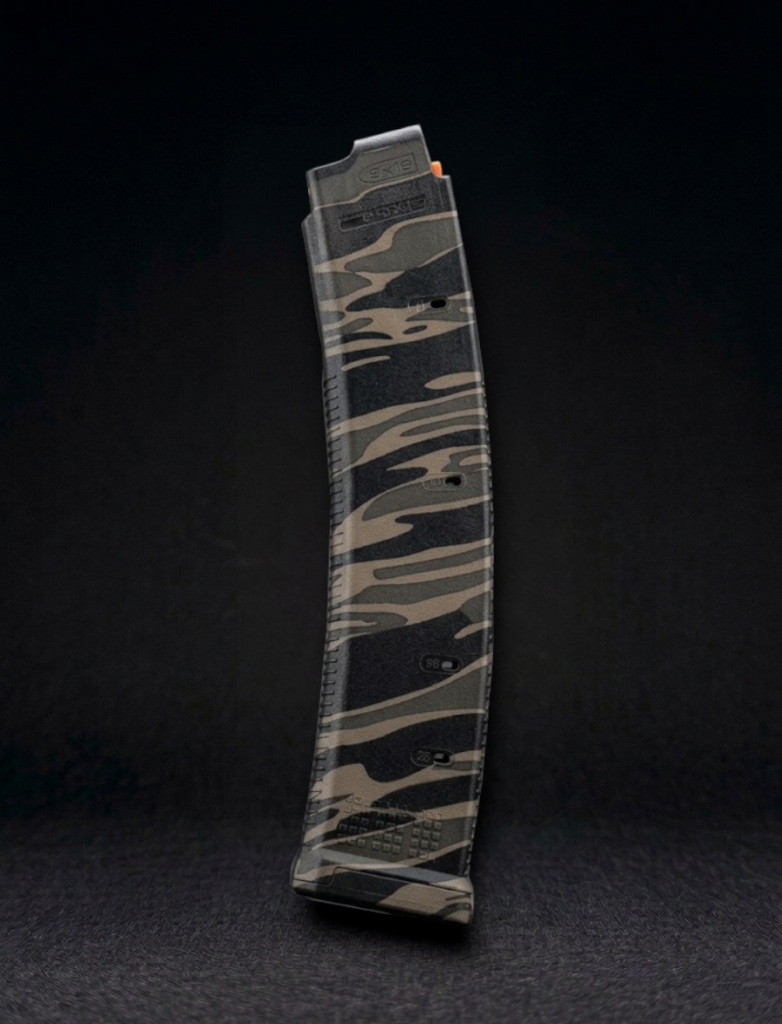 side view of a CZ Scorpion magpul pmag laser engraved with Urban tiger stripe camo pattern