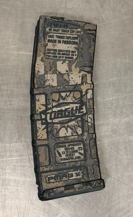 side view of a magpul pmag laser engraved with borderlands torgue theme