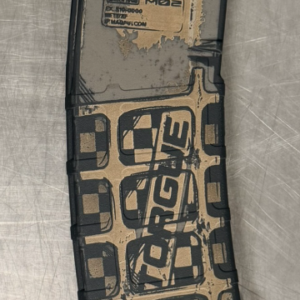side view of a magpul pmag laser engraved with borderlands torgue theme